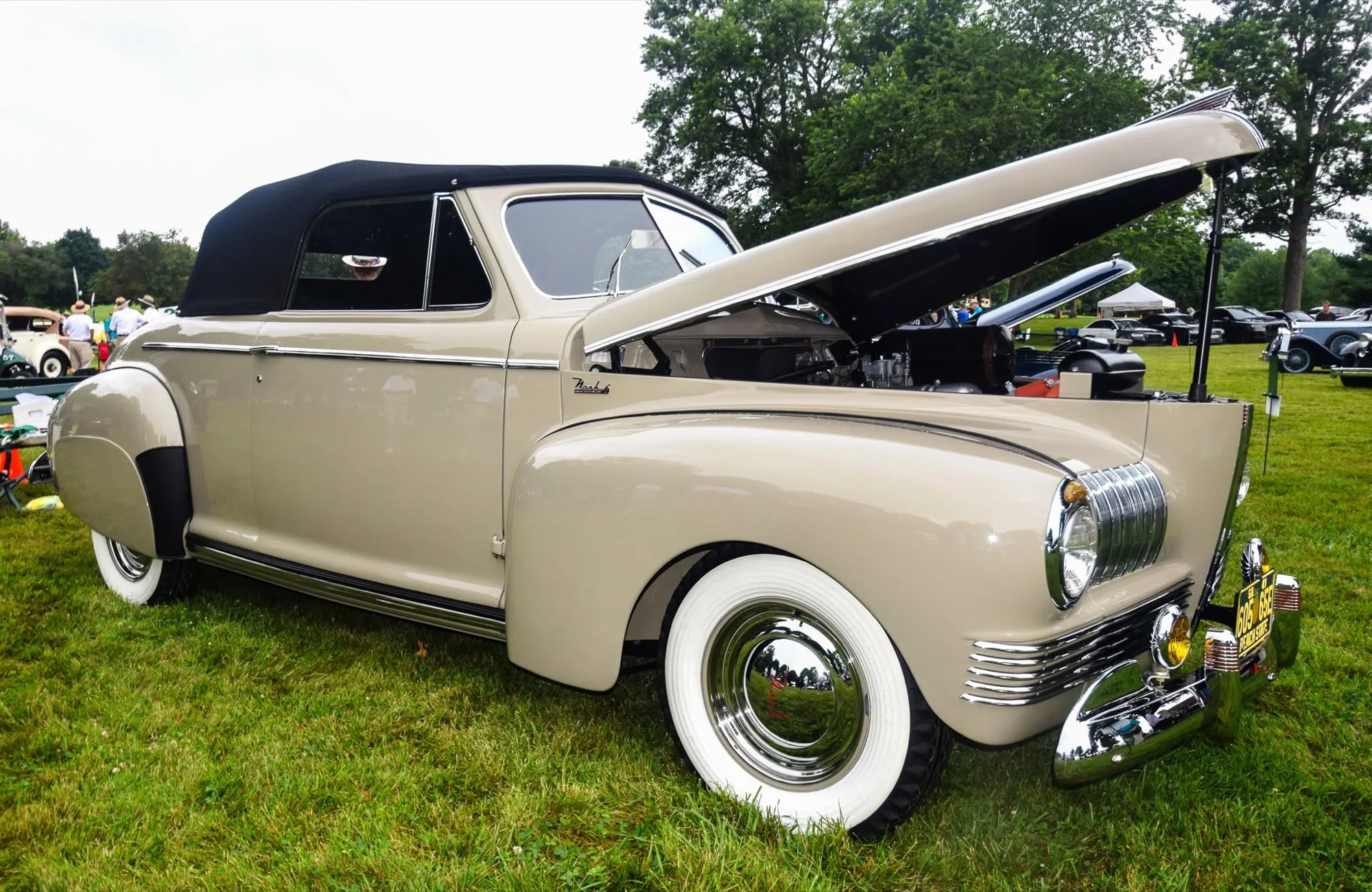 The finished 1941 Nash Ambassador 6 — tan body, black top, hood raised.