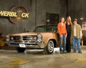 The family on the PowerBlock TV set with host Courtney Hansen and a gold 1963 Pontiac Grand Prix